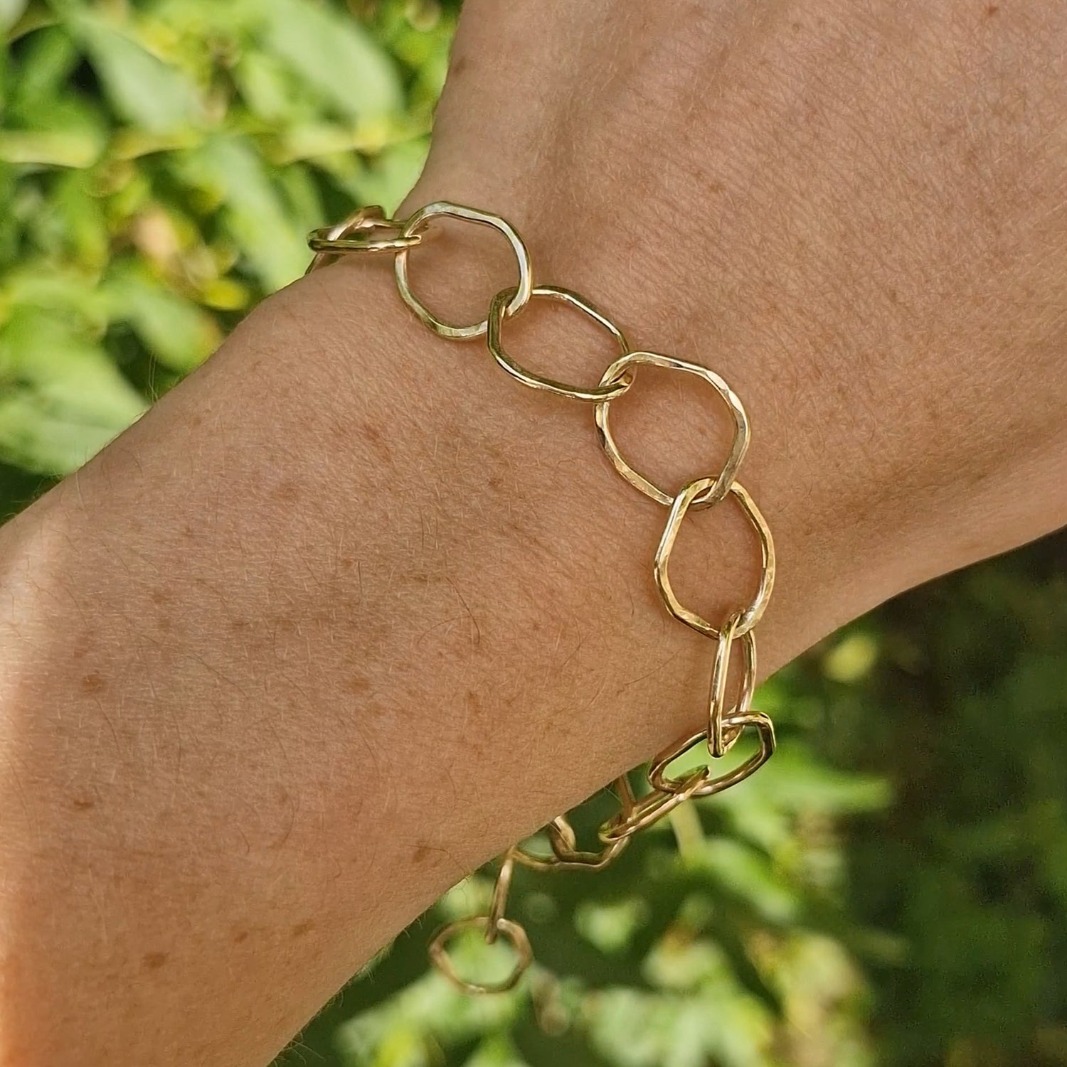 Handmade silver jewellery collection 'Ripple' inspired by the quick movement of water, featuring kinks and dappled textures