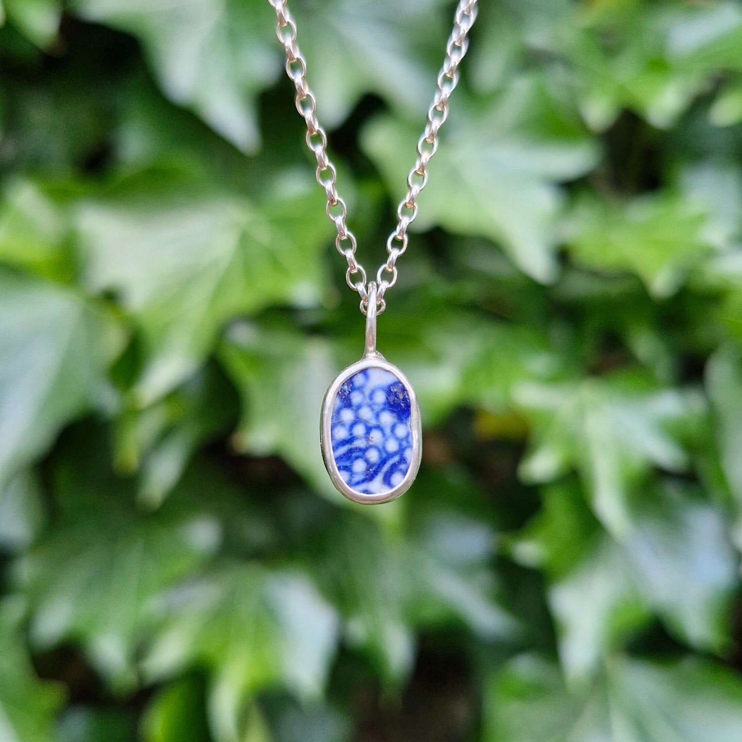 Handmade silver jewellery collection incorporating bits of old pottery found in Lacock Village, creating unique and nostalgic designs