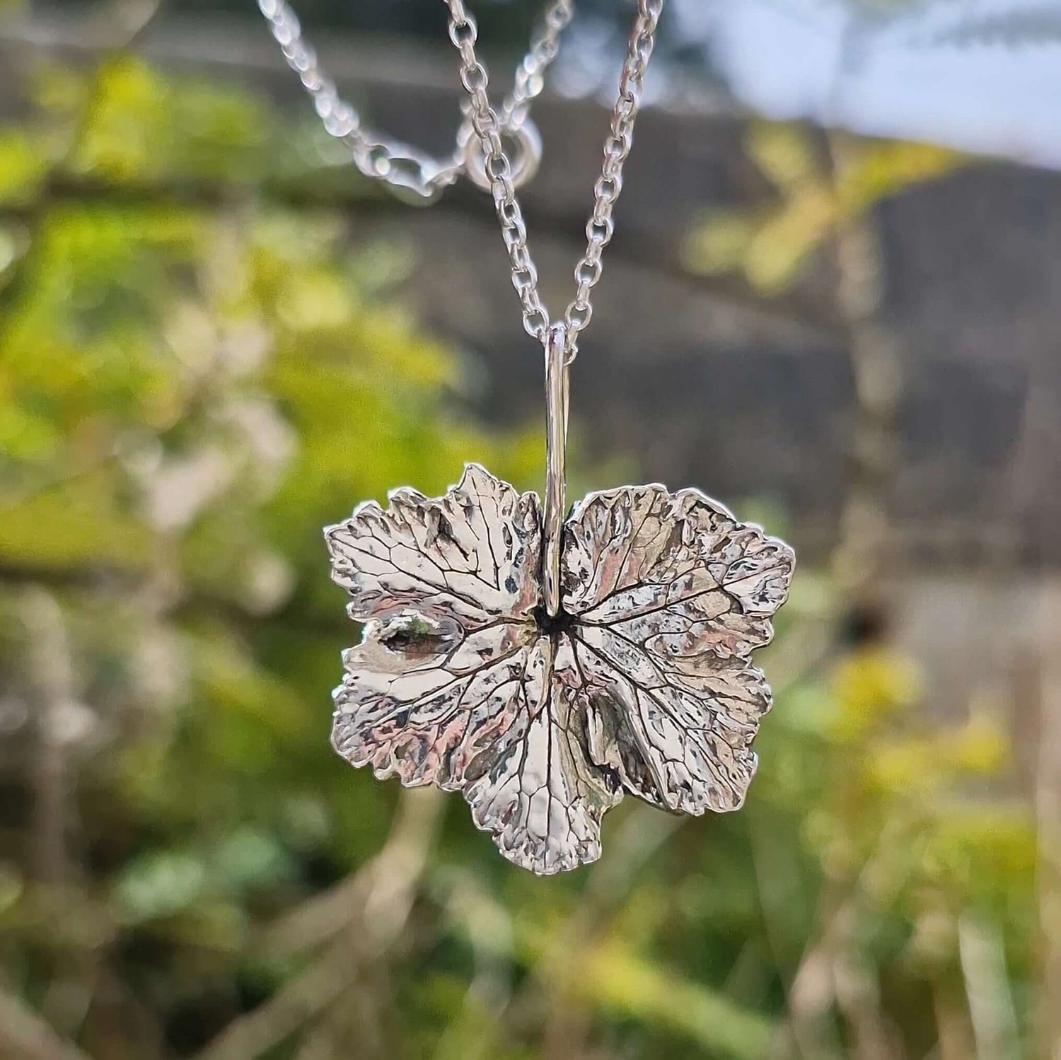 Handmade silver jewellery collection 'Imprints' featuring unique pieces created from direct imprints of organic materials like leaves and flowers